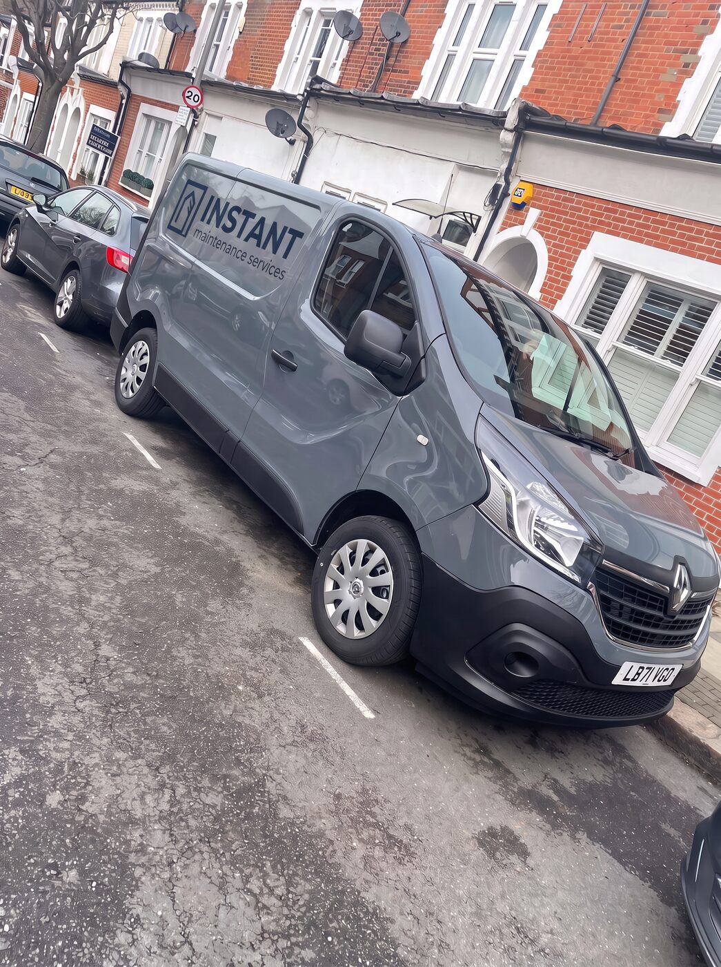 Instant Maintenance and Building Services van parked on a South London residential street